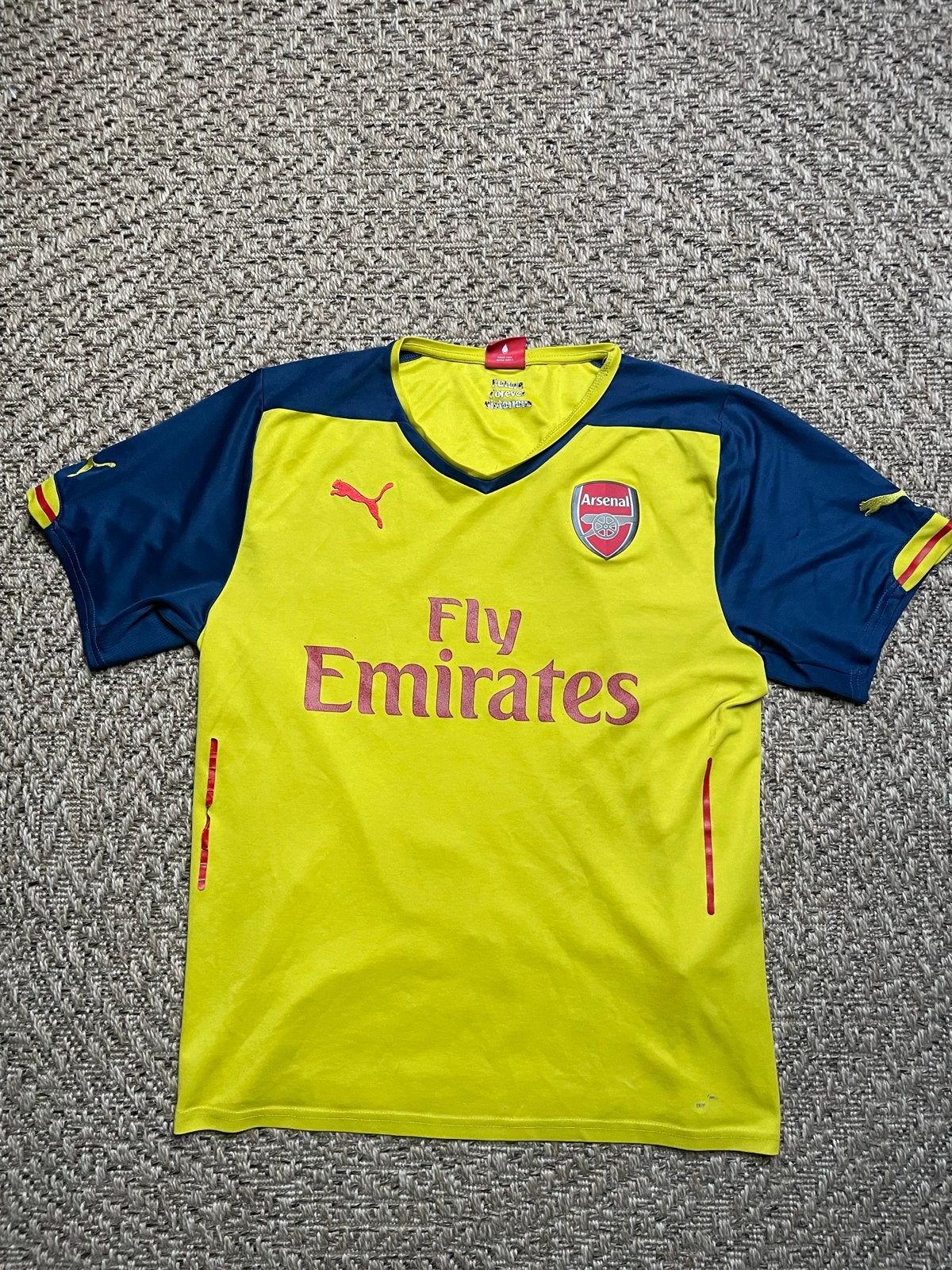 Arsenal Uitshirt 2014/15 Puma - Alexis Sánchez Debuut, Ophalen of Verzenden, Gedragen, Maat 42/44 (L), Geel