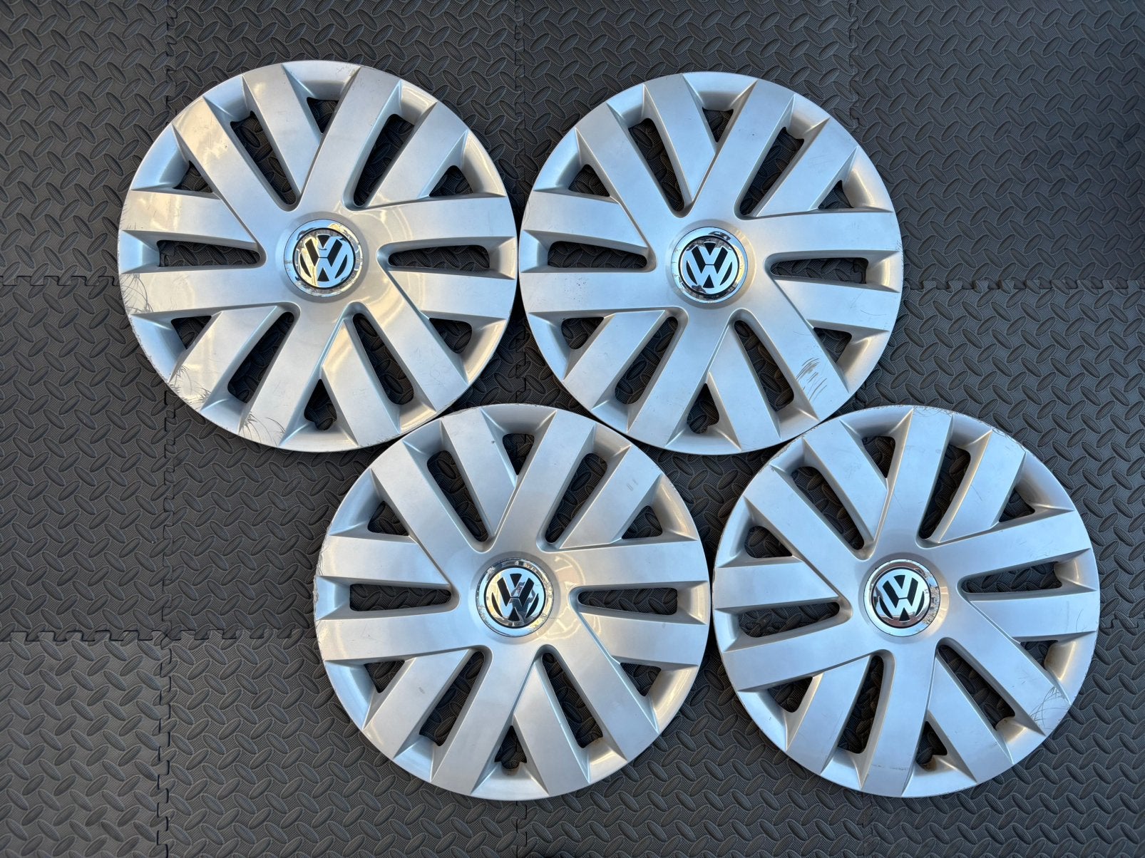 Set originele Volkswagen Polo wieldoppen 15 inch, Auto diversen, Wieldoppen, Ophalen of Verzenden, Gebruikt