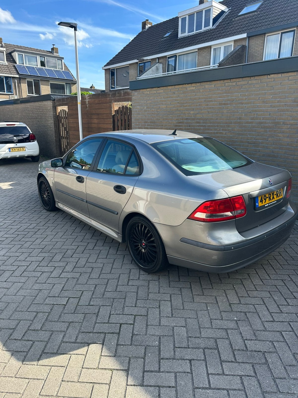 Saab 9-3 1.8 T Sport Sedan AUT 2005 Grijs, Auto's, 1998 cc, 4 cilinders, Origineel Nederlands, Particulier