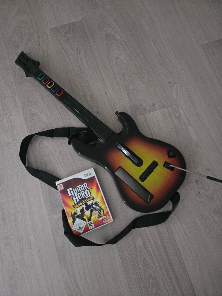 Guitar hero world tour Nintendo wii, Spelcomputers en Games, Games | Nintendo Wii, Ophalen, Muziek, Zo goed als nieuw, 3 spelers of meer