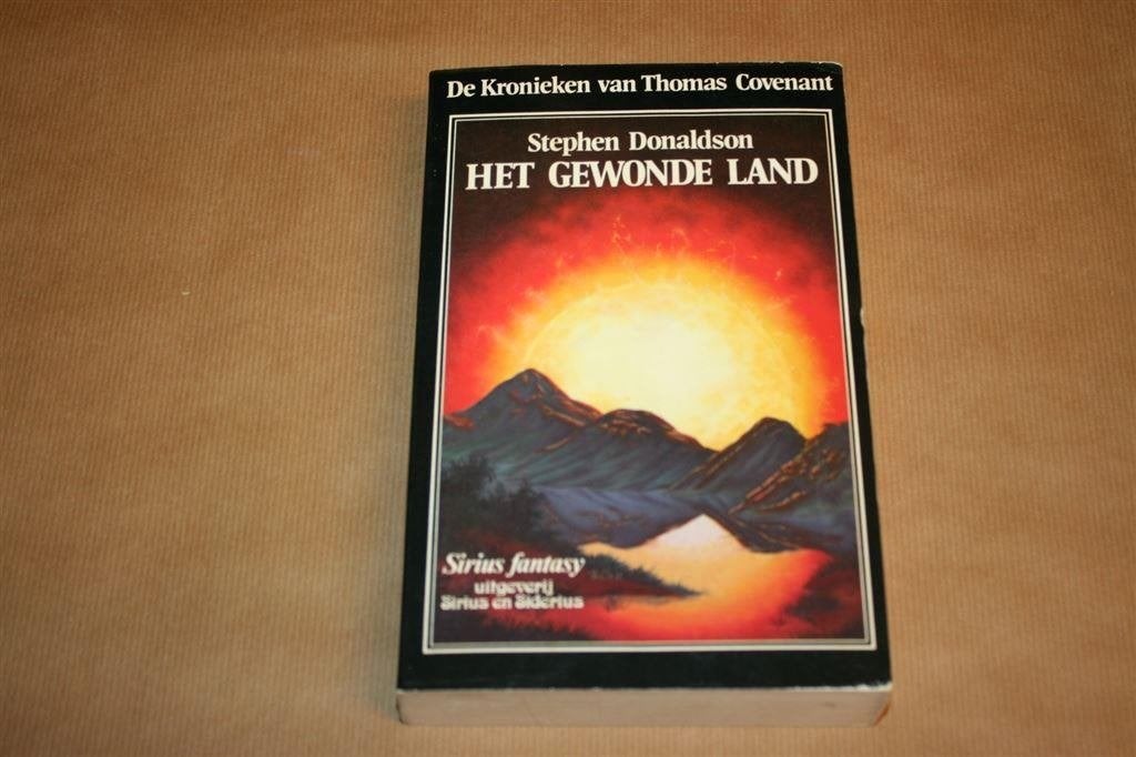 Het gewonde land. Stephen Donaldson., Boeken, Science fiction, Gelezen, Ophalen of Verzenden