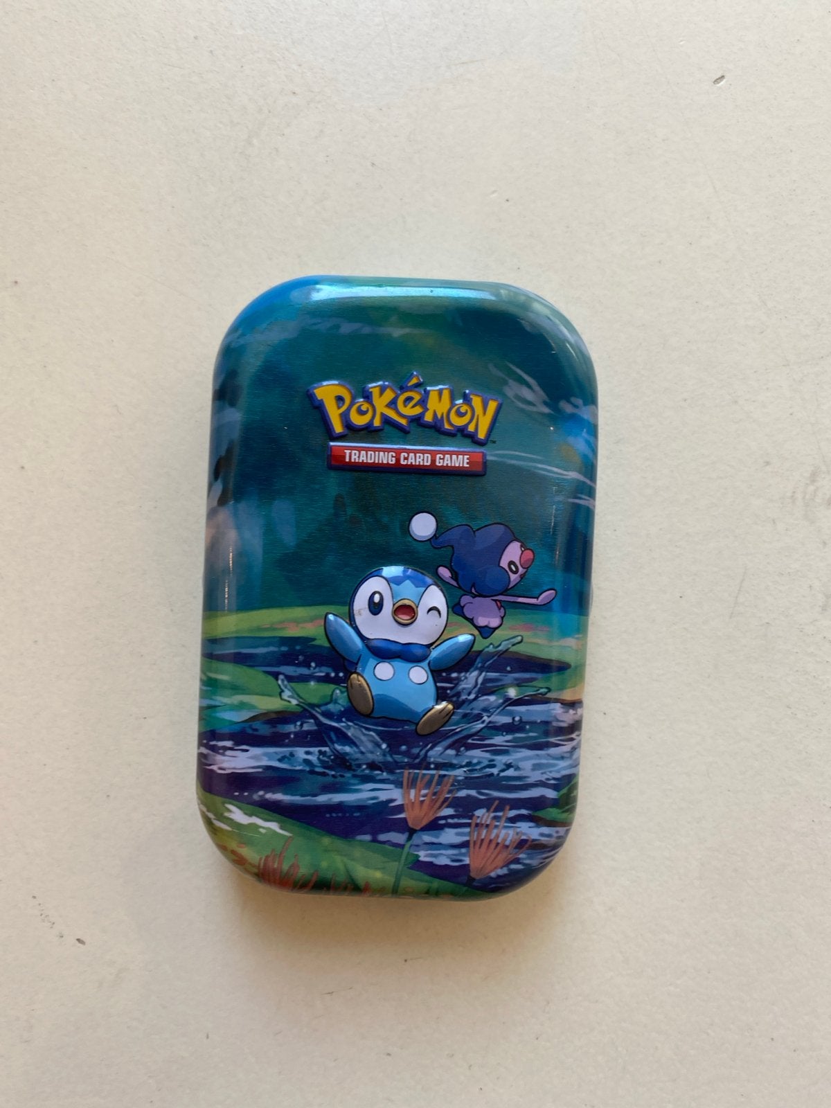 Pokémon Mystery Box - Piplup & Croagunk Tin, Ophalen of Verzenden, Gebruikt, Overige typen