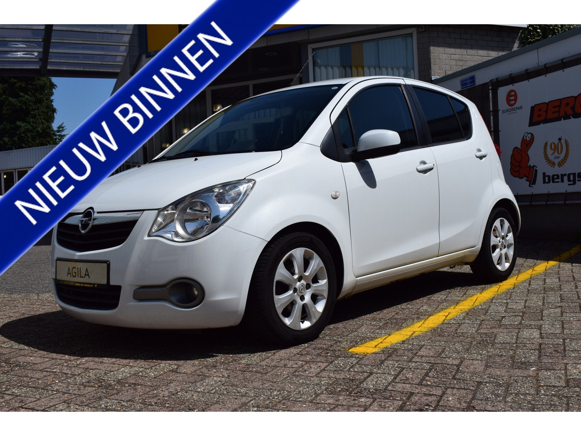 Opel Agila AUTOMAAT 1.2 Enjoy AIRCO (bj 2009), Auto's, 4 cilinders, Wit, Bedrijf, Geïmporteerd