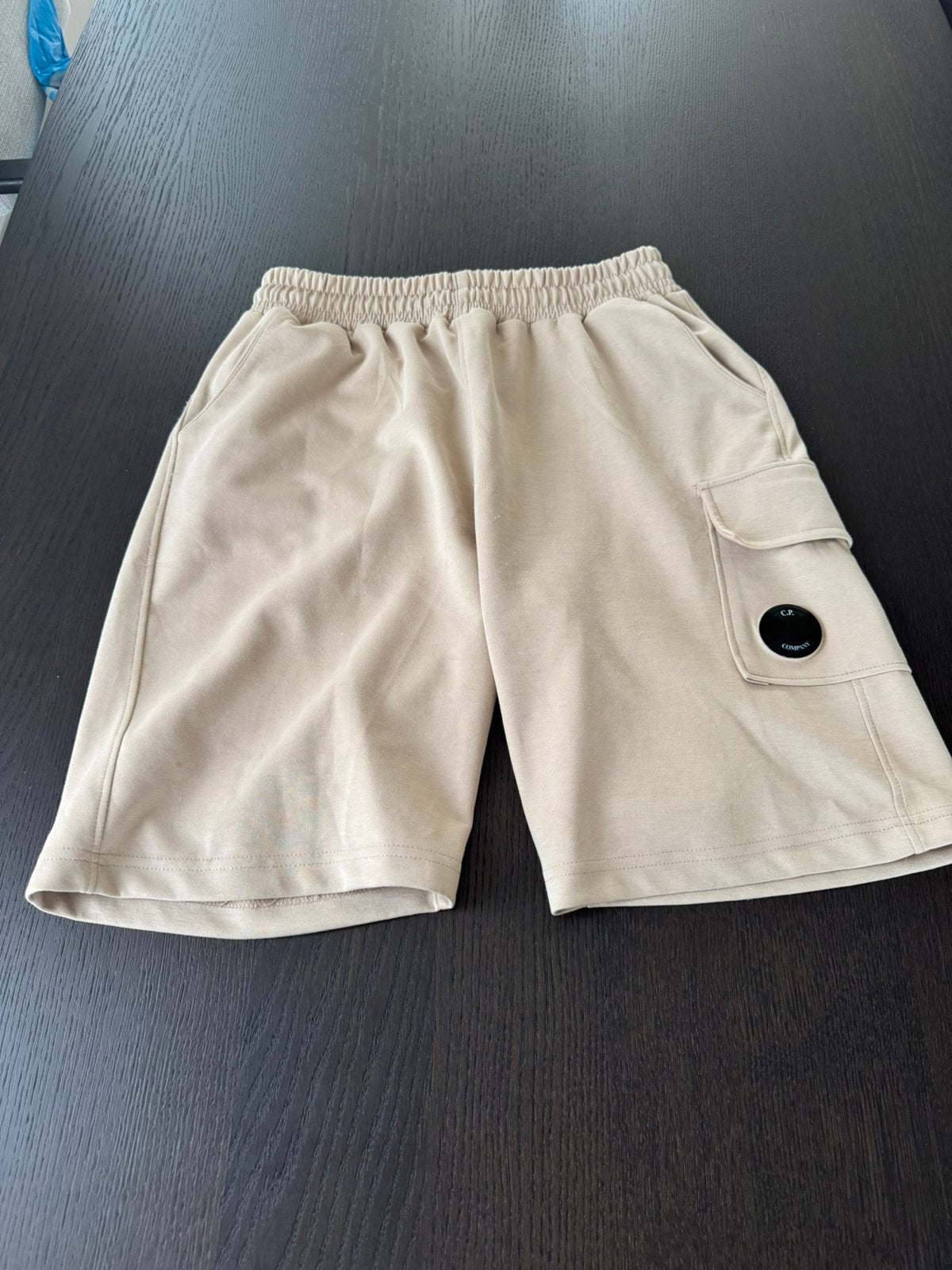 C.P company korte broek, Kleding | Heren, Ophalen of Verzenden, Zo goed als nieuw, Maat 56/58 (XL), Beige