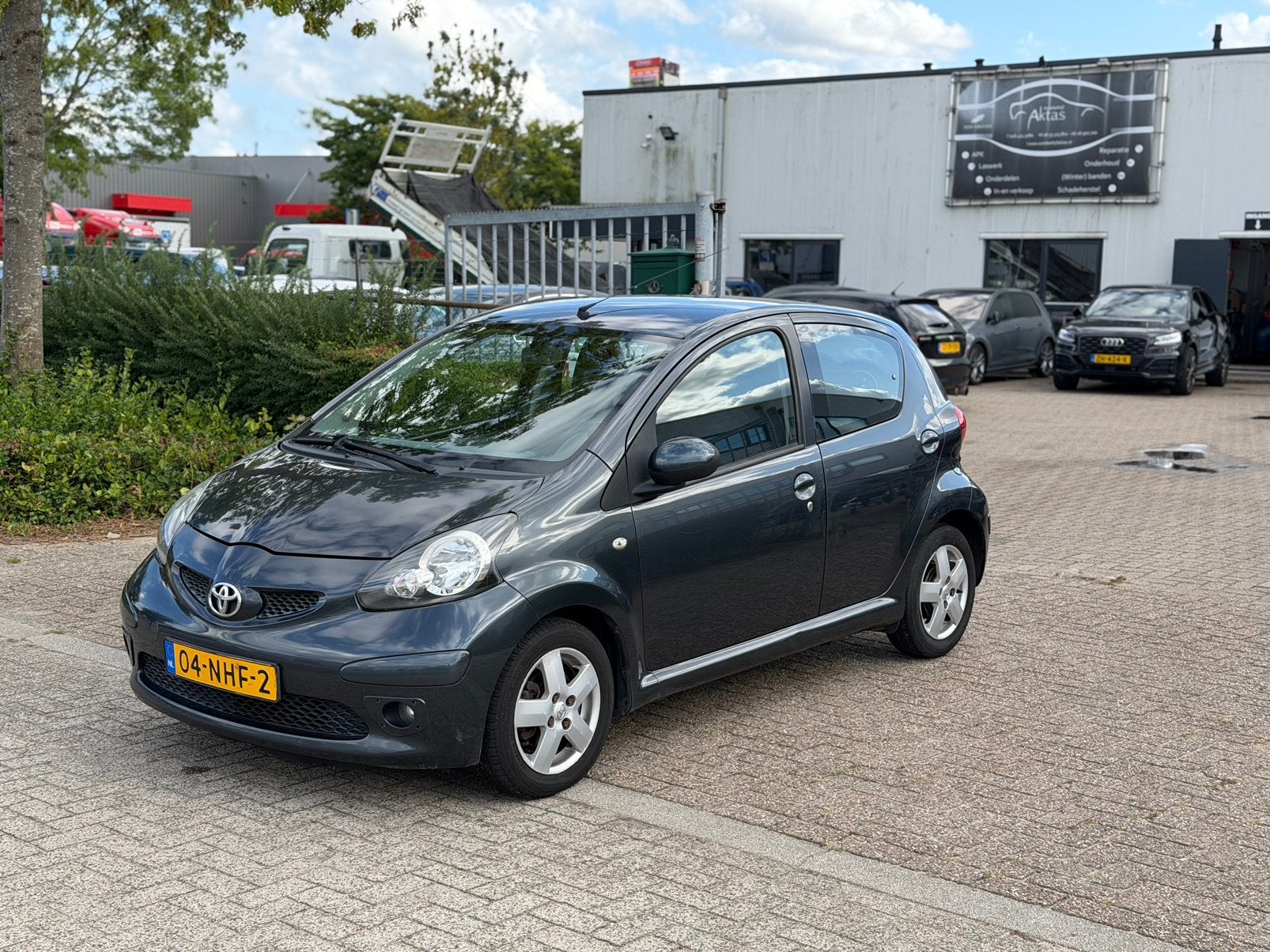 Toyota Aygo 1.0 12V Vvt-i 5DRS 2010 Grijs, Auto's, Voorwielaandrijving, Stof, Zwart, 4 stoelen