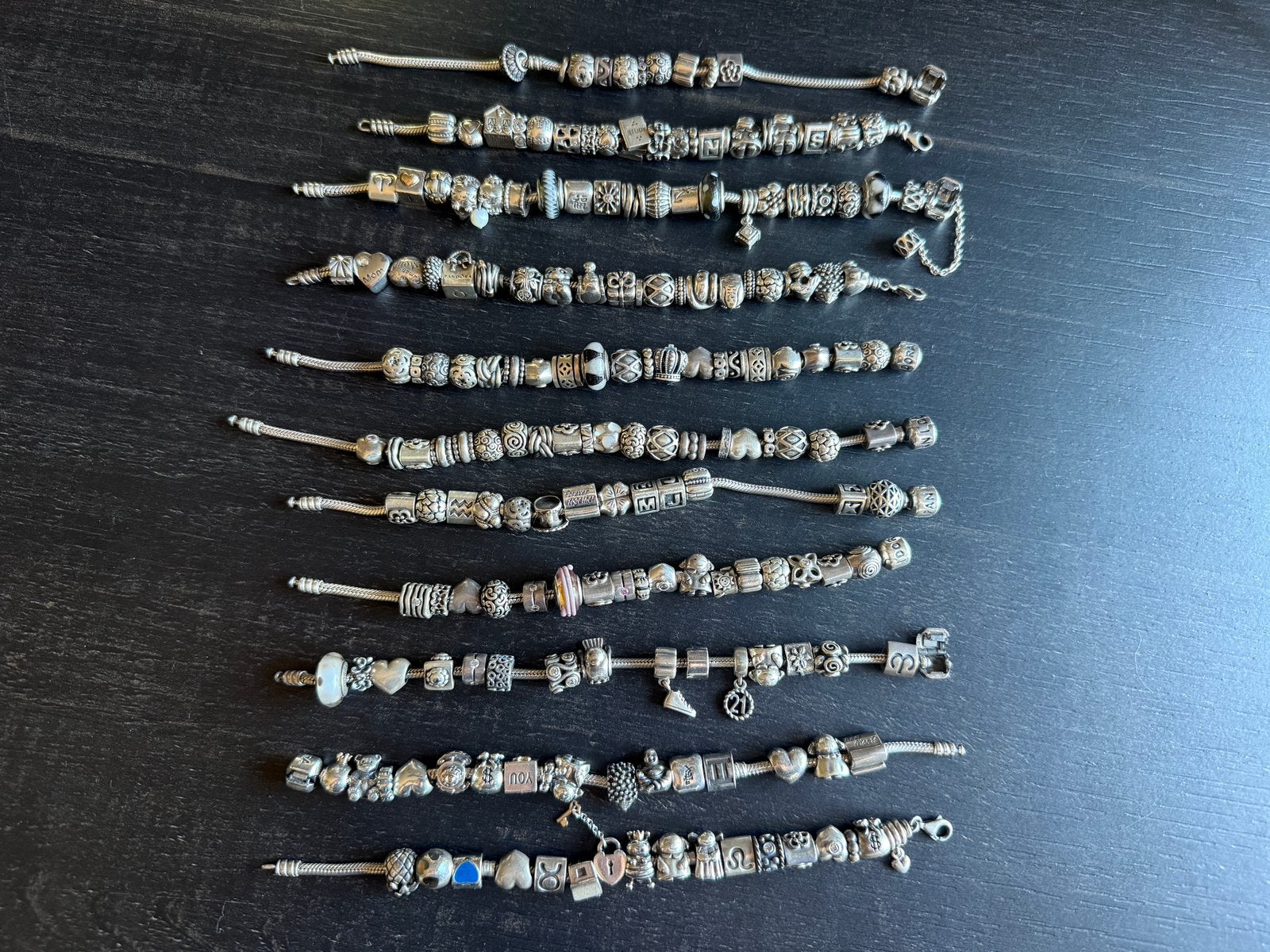 Hele collectie Pandora armbanden en bedels., Sieraden, Tassen en Uiterlijk, Gebruikt, Pandora, Ophalen of Verzenden, 4 bedels of meer