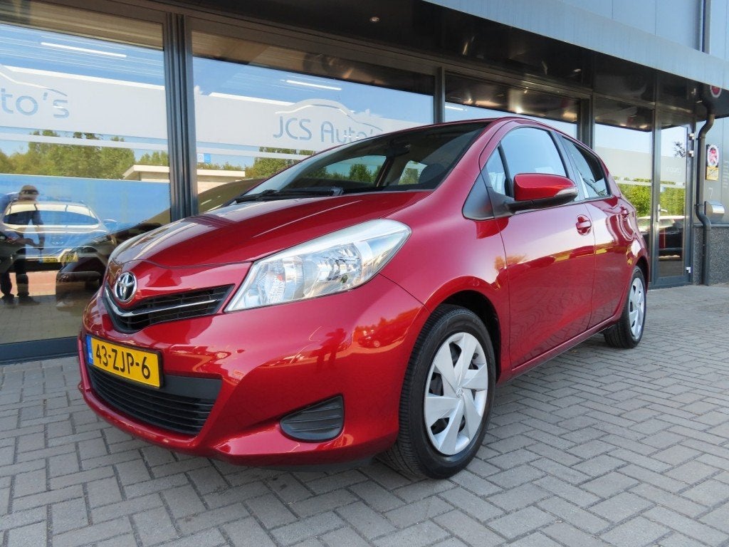Toyota YARIS 1.3 VVT-i Aspiration Aut. Airco Cruise Navi Cam, Auto's, Euro 5, 4 cilinders, Bedrijf, 99 pk