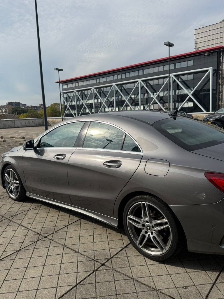 Mercedes-Benz CLA 180 1.6 90KW 7G-DCT (aut) 2018 Grijs, Auto's, Euro 6, 4 cilinders, 715 kg, Alcantara