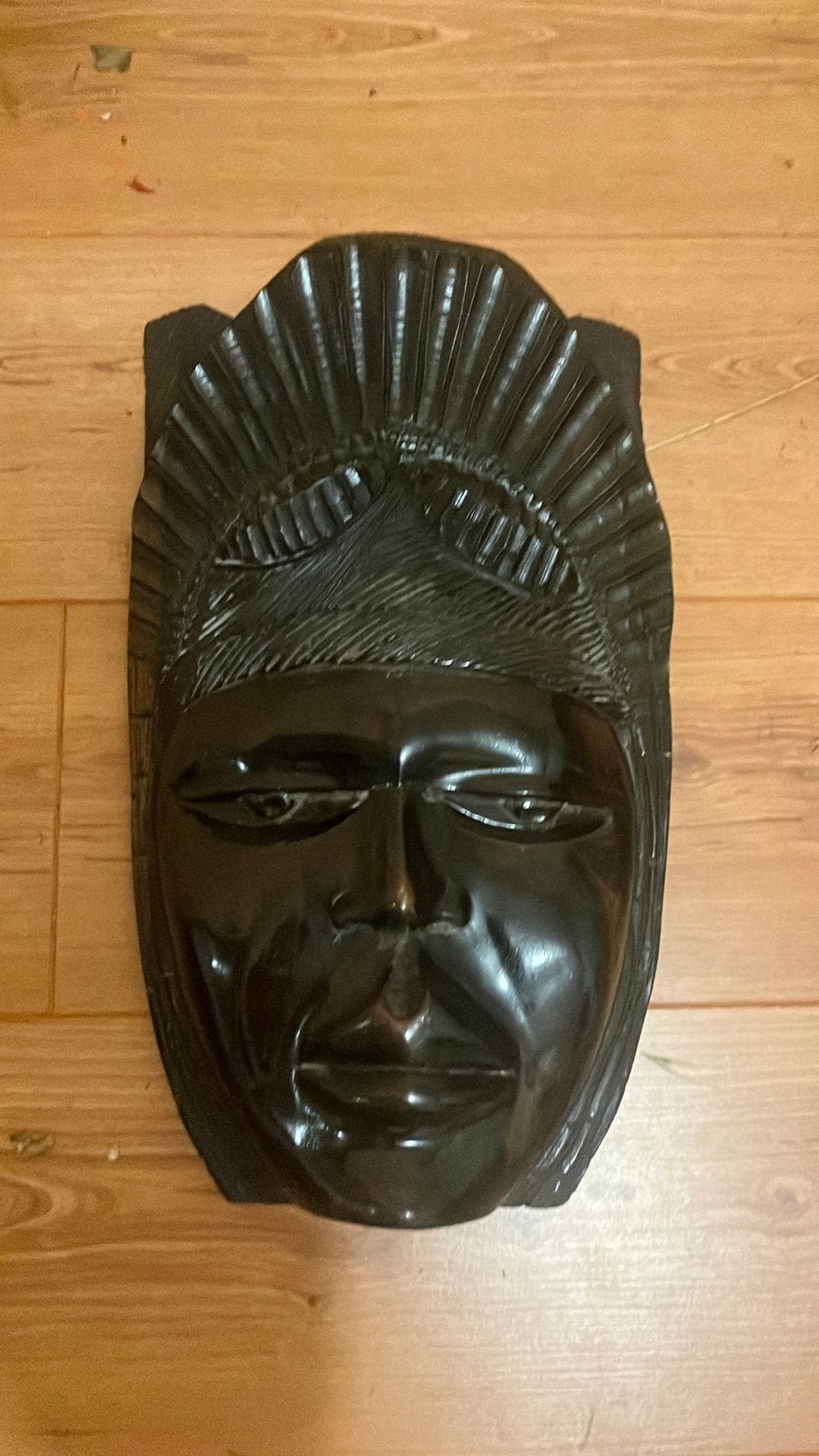 Houten zware gezichtsmasker, Ophalen