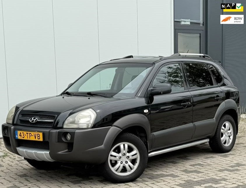 Hyundai Tucson 2.0i Dynamic Cross, Auto's, Dealer onderhouden, Gebruikt, 4 cilinders, Zwart