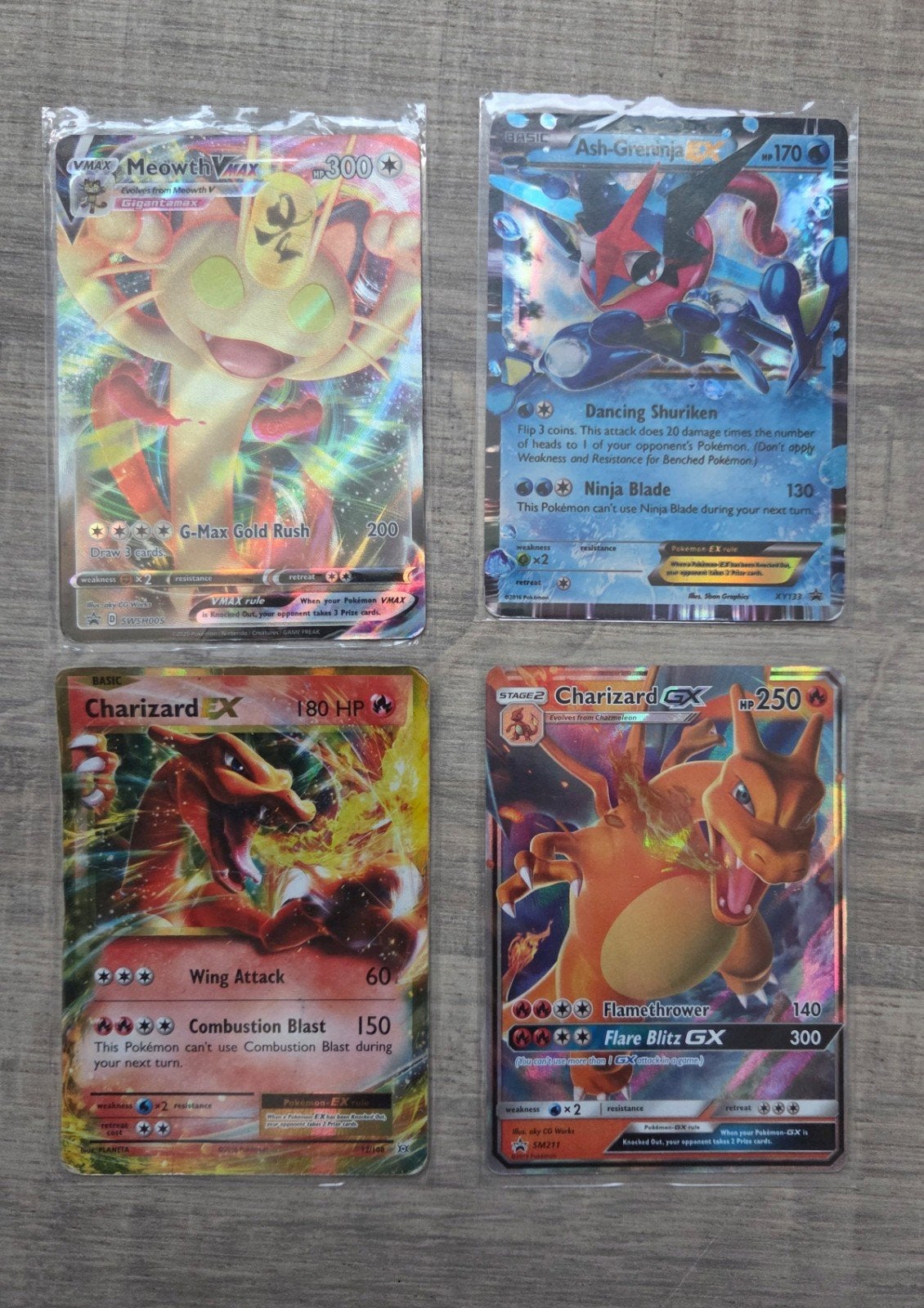 Diverse Pokémonkaarten: Charizard, Pikachu, Meowth VMAX, Ophalen of Verzenden, Zo goed als nieuw, Meerdere kaarten, Foil
