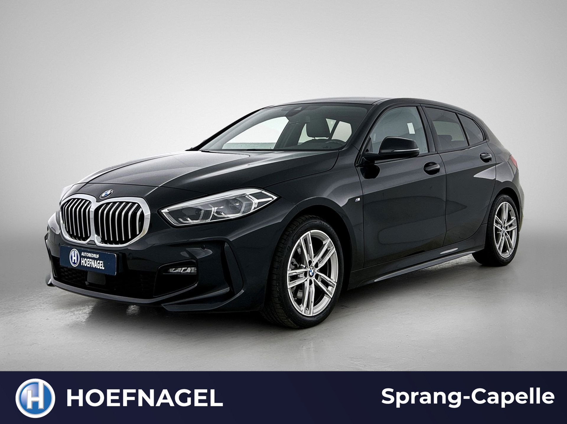 BMW 1-serie 118i Executive M Sport | Stoelverwarming | Cruis, Auto's, Gebruikt, Zwart, Bedrijf, 3 cilinders