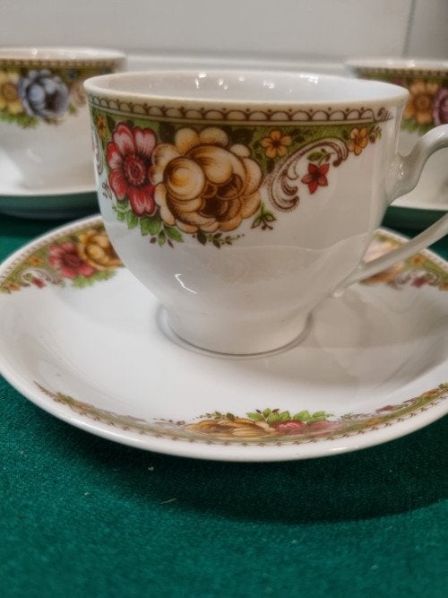 kop en schotel met bloemen decor, Antiek en Kunst, Antiek | Servies los, Ophalen of Verzenden