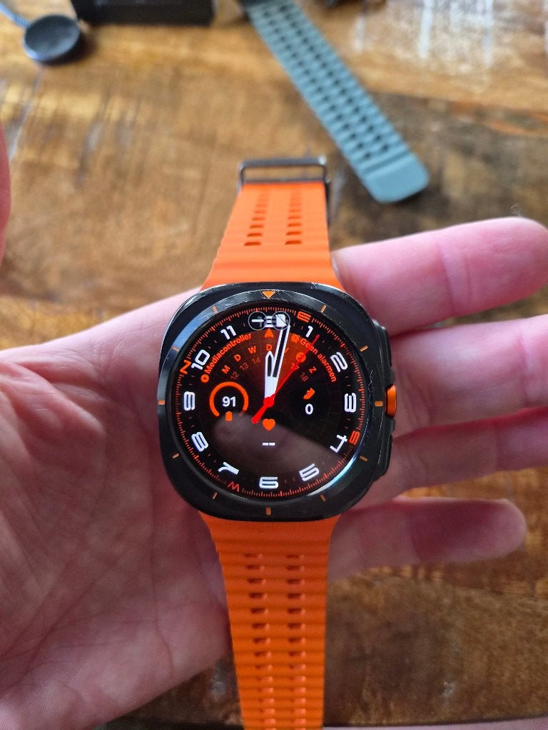Samsung Galaxy Watch Ultra 45mm Zwart met Oranje Bandje, Gebruikt, Stappen, Zwart, Ophalen of Verzenden