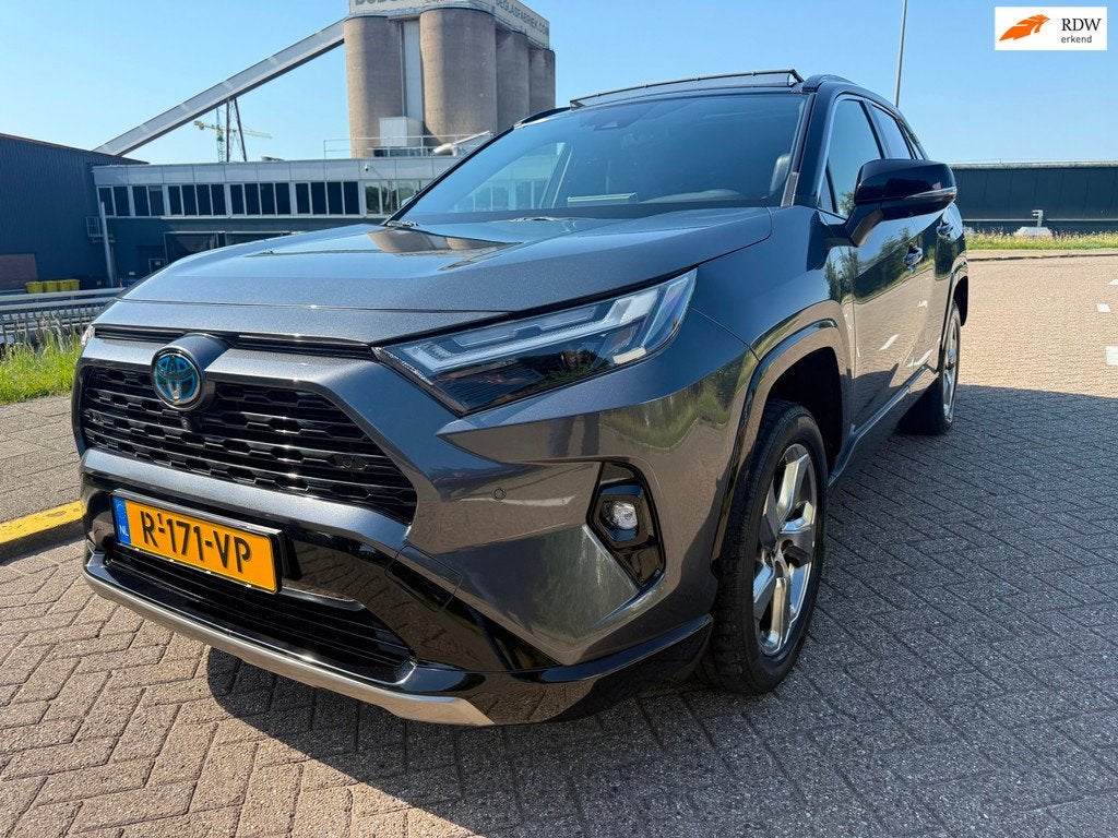 Toyota RAV4 2.5 Hybrid AWD Style_PANORAMADAK_NETTE AUTO, Auto's, Toyota, Automaat, Gebruikt, Euro 6, 4 cilinders
