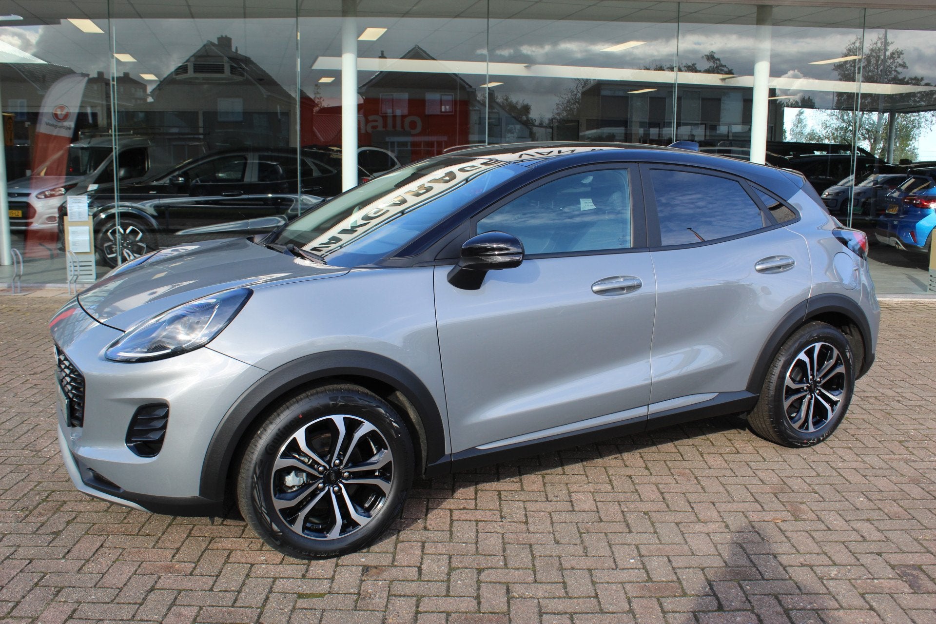 Ford Puma 1.0-125pk EcoBoost Hybrid Titanium Nieuw Model Nav, Auto's, Ford, Stof, Zwart, 24 maanden, Origineel Nederlands