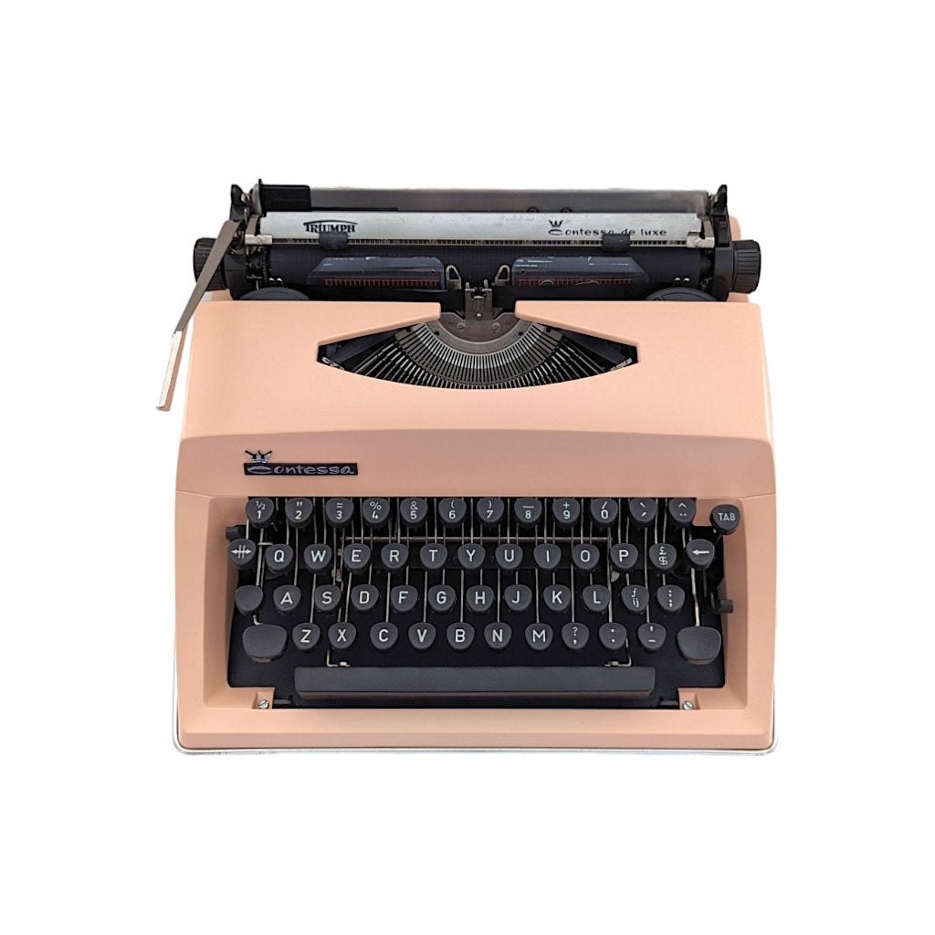 Typemachine Triumph Contessa zacht oranje roze - gereviseerd, Diversen, Typemachines, Ophalen, Zo goed als nieuw