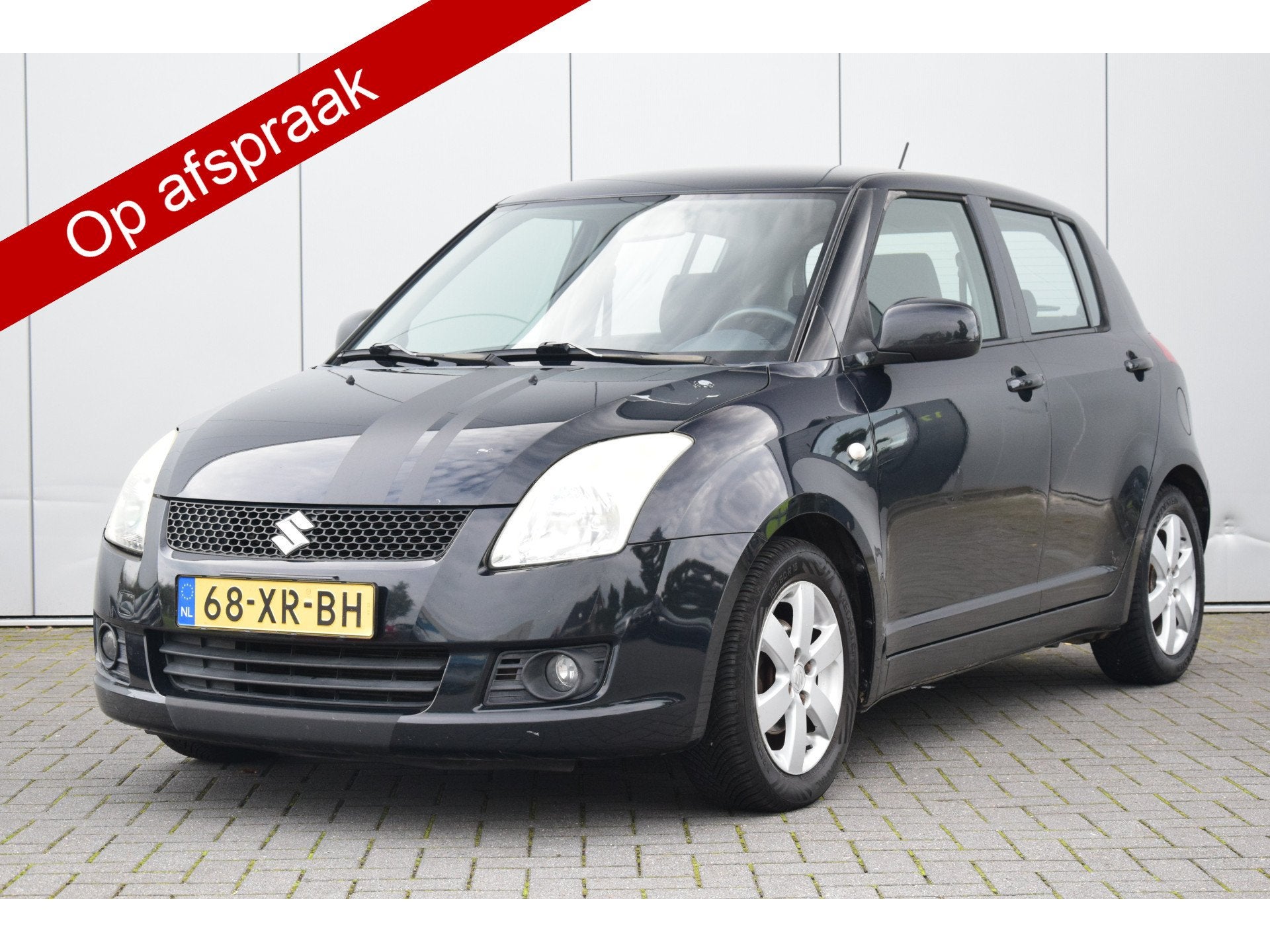 Suzuki Swift 1.3 Shogun VERSNELLINGSBAK MAAKT IETSJE LAWAAI, Voorwielaandrijving, Stof, Zwart, 400 kg