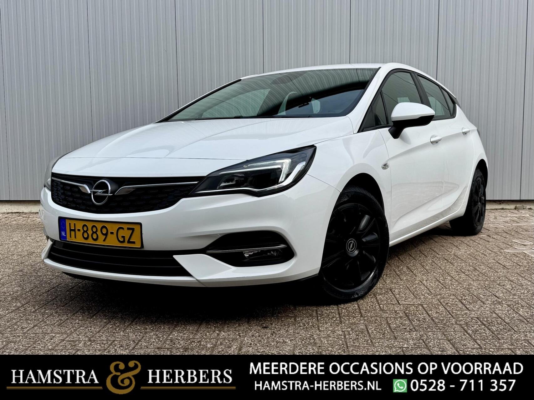 Opel Astra 1.2 Business Edition wit, Auto's, Gebruikt, Euro 6, 1199 cc, 620 kg