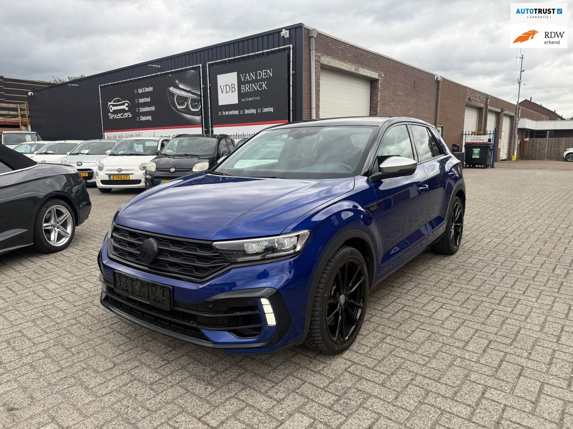 Volkswagen T-Roc 2.0 TSI 4Motion Sport R 380pk powerbox akra, Automaat, Gebruikt, Blauw, 14 km/l
