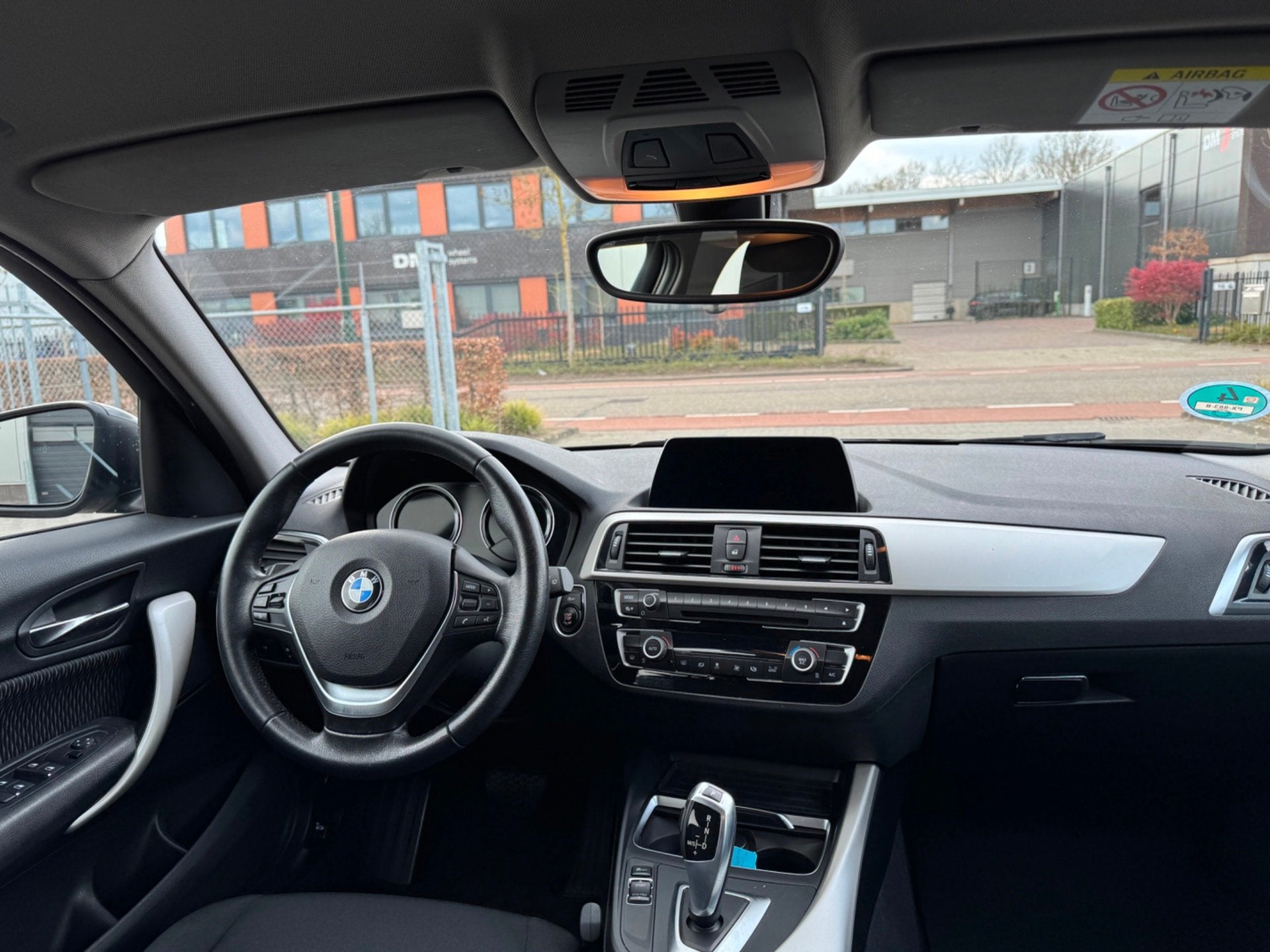 BMW 1-serie 118i Corporate Lease Executive, Auto's, BMW, 12 maanden, Gebruikt, Zwart, Origineel Nederlands