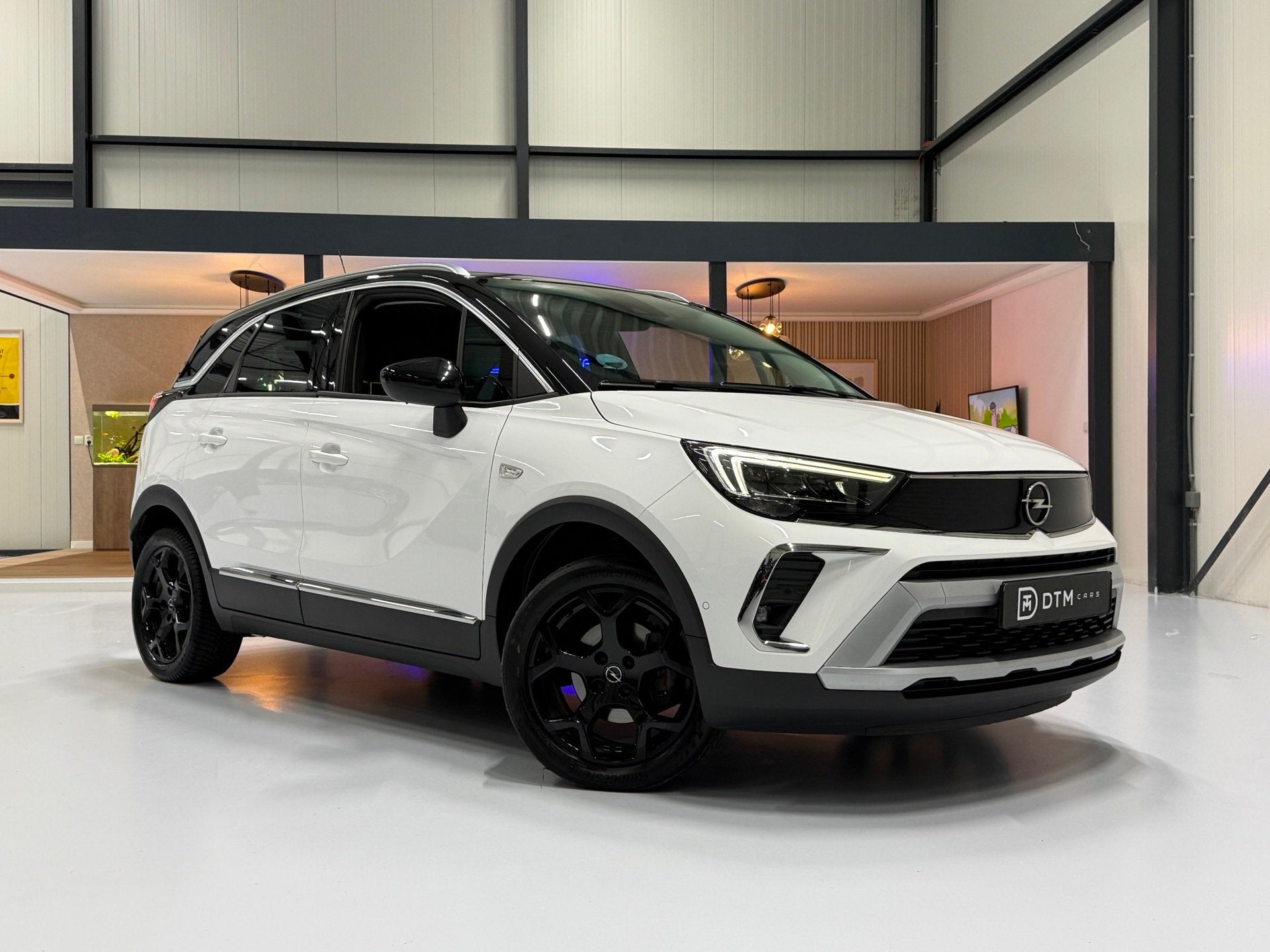 Opel Crossland X 1.2 Ultimate Aut. 130pk Black Ed. Navi 360, Auto's, Opel, Dealer onderhouden, 840 kg, Wit, Origineel Nederlands