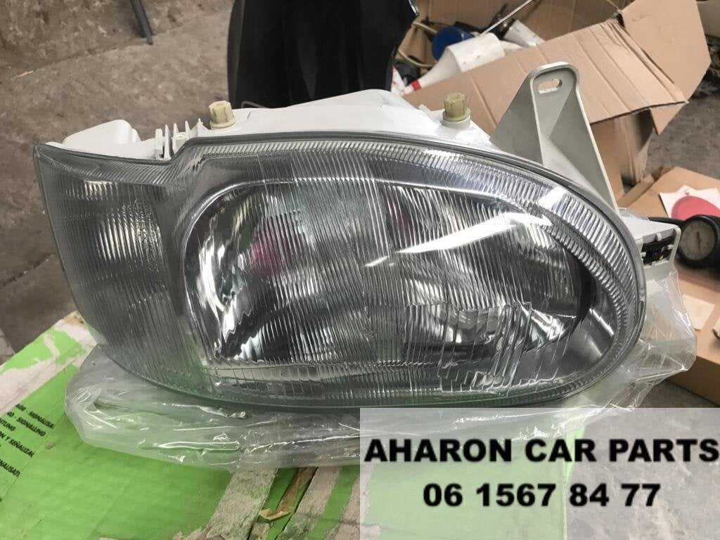 Ford Escort 5 Orion koplamp Rechts 1990- Nieuw Origineel 857, Gebruikt