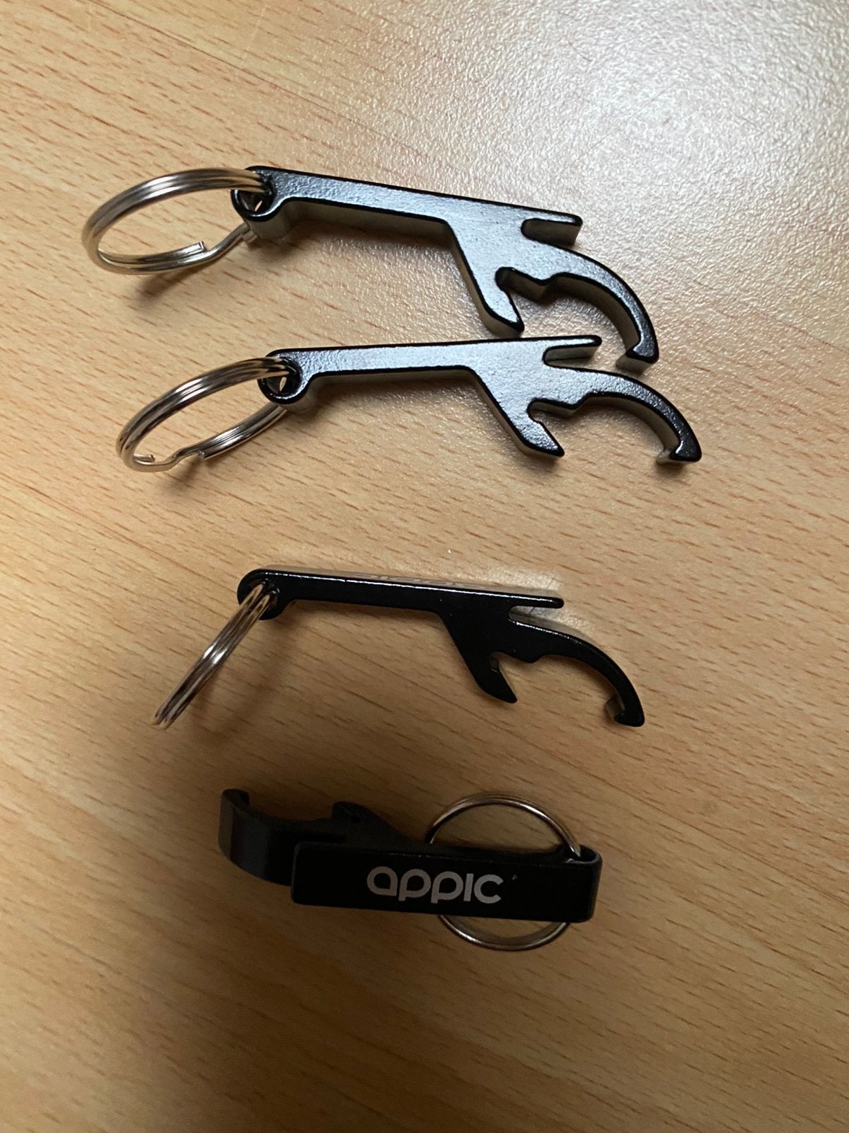 Nieuw 4 flesopener zwart met sleutelhanger fles opener, Ophalen of Verzenden, Nieuw, Merk