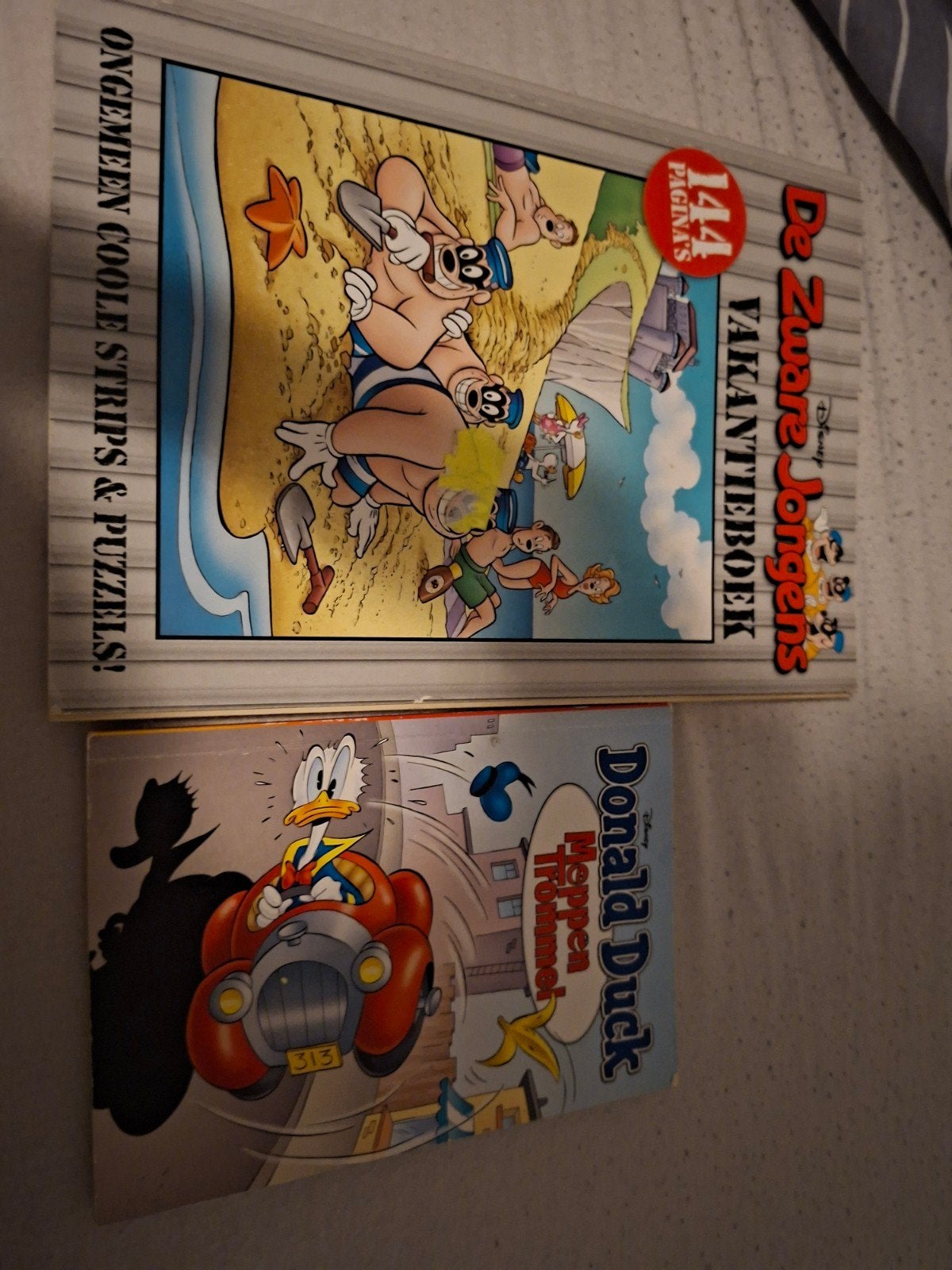 De zware jongens vakantieboek + Donald duck moppentrommel, Eén comic, Ophalen, Zo goed als nieuw, Europa