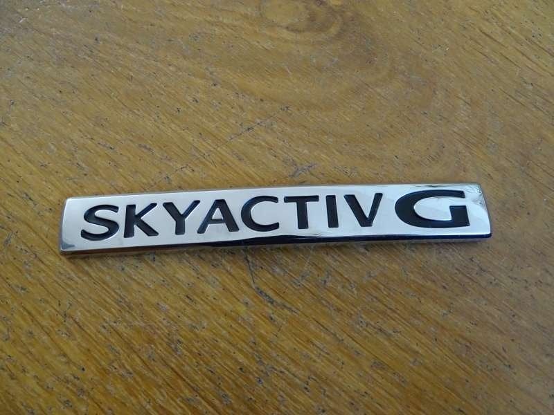 Mazda Skyactiv-G - Embleem Logo - Origineel Mazds, Verzenden, Gebruikt, Auto's