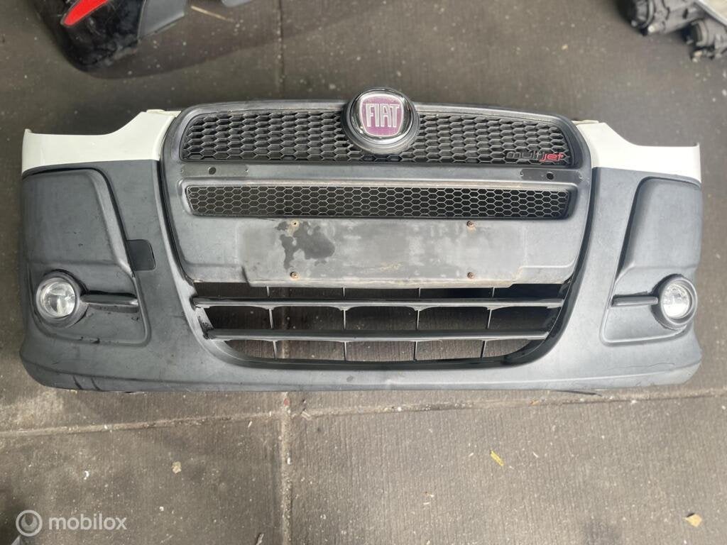 Voorbumper origineel Fiat Doblo Cargo II ('10-'19), Gebruikt, Fiat, Voor, Ophalen of Verzenden