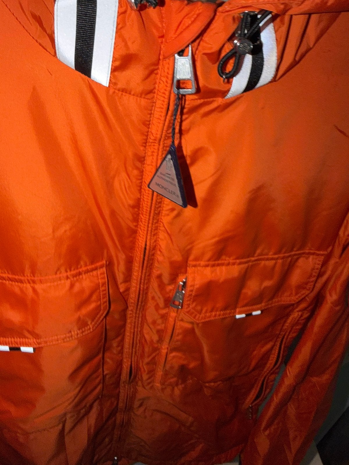 Oranje Moncler jas, Ophalen of Verzenden, Zo goed als nieuw, Maat 52/54 (L), Zwart