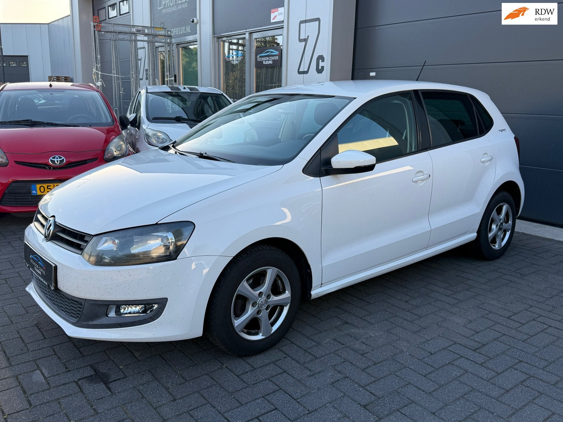 Volkswagen Polo 1.2 TSI AIRCO | CRUISE | PDC | TEAM EDITIE |, Auto's, Voorwielaandrijving, Euro 5, Stof, Wit