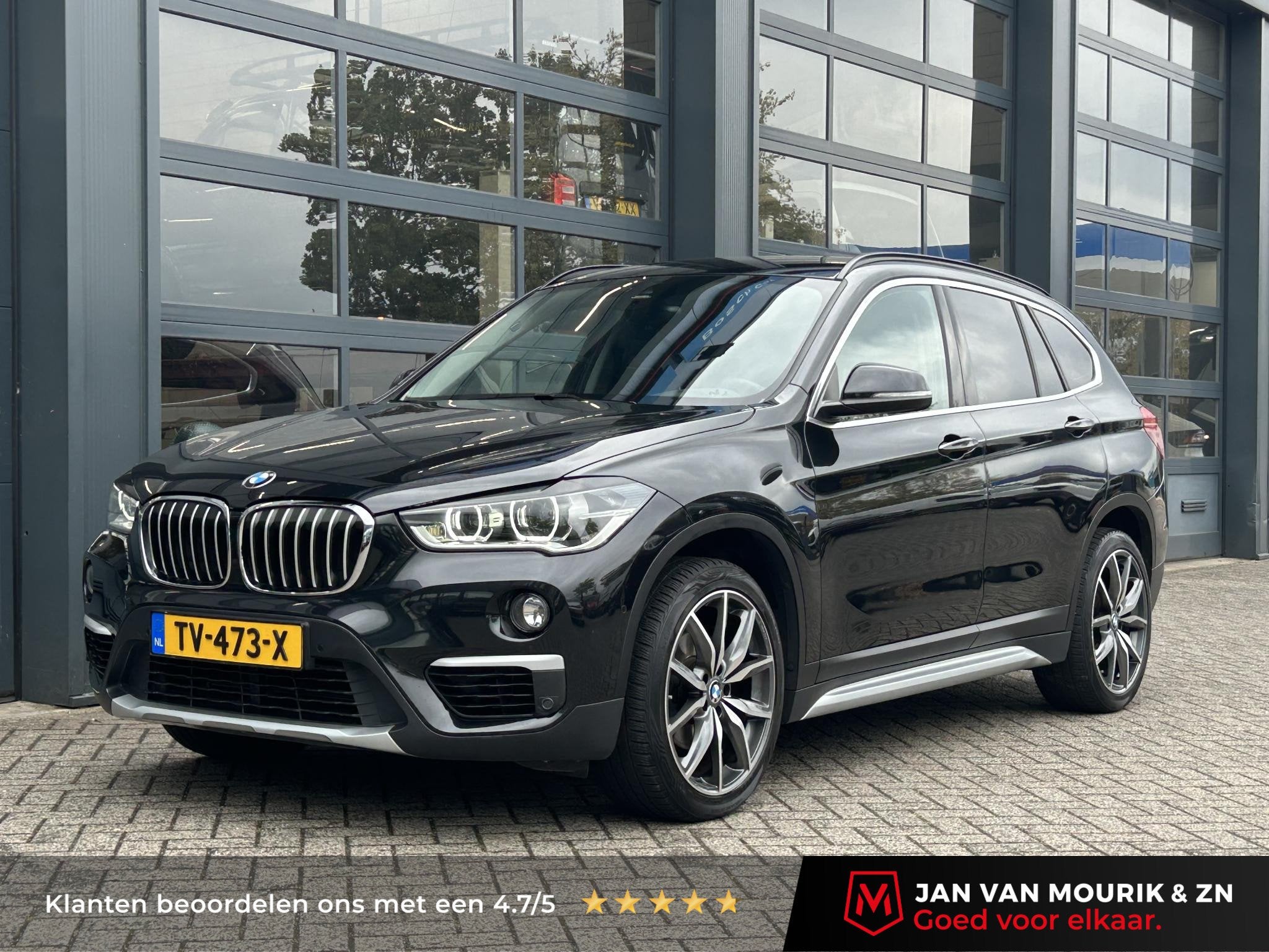 BMW X1 sDrive18i Executive | Trekhaak | Navi | Leder, Stof, Gebruikt, Met garantie (alle), Zwart
