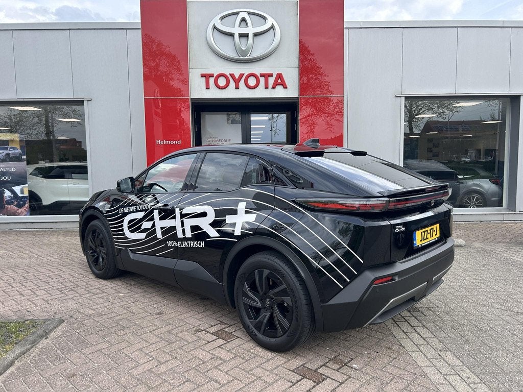 Toyota C-HR+ First Edition 77 kWh, Auto's, Toyota, Gebruikt, 607 km, Leder en Stof, Zwart