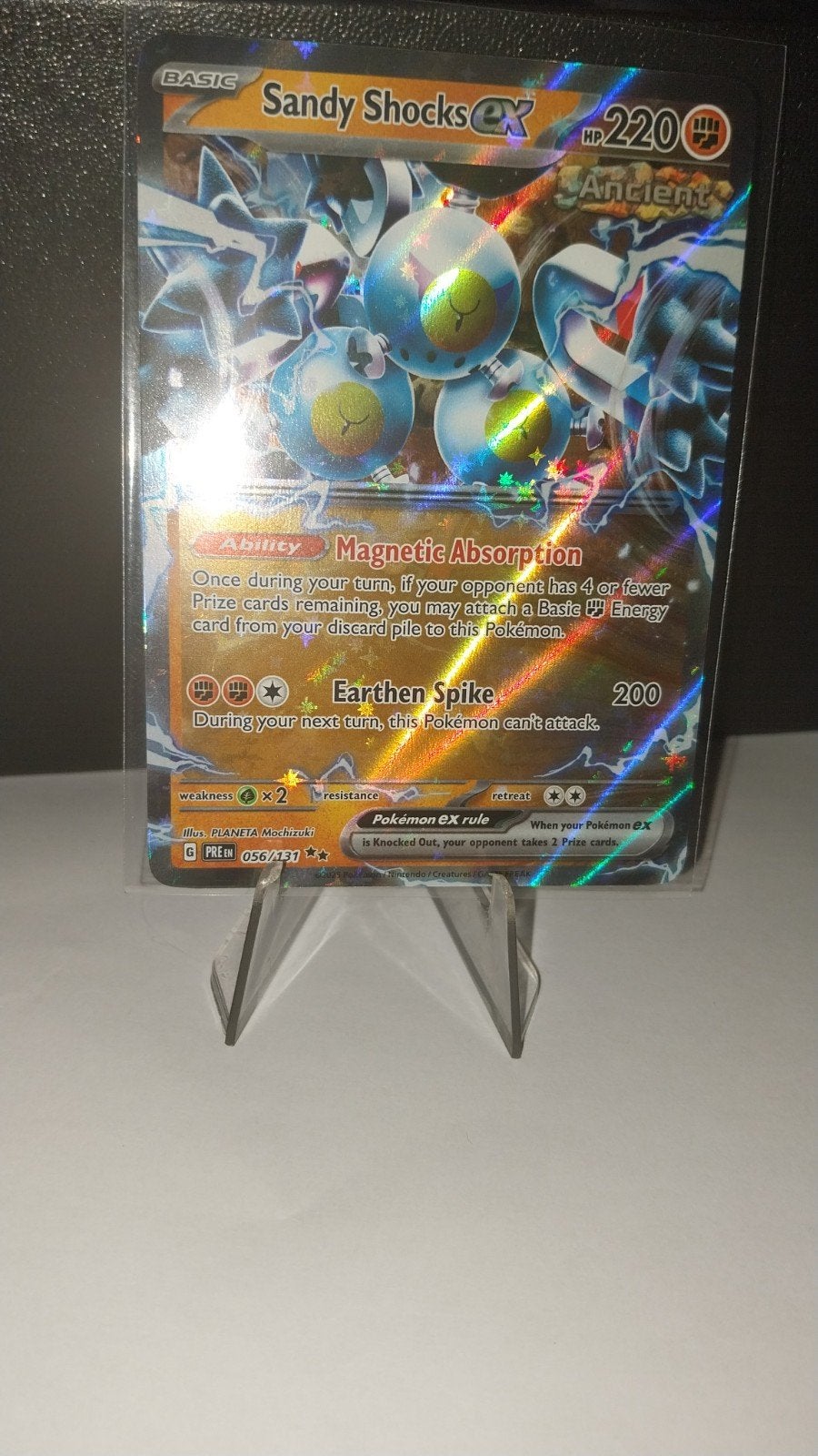 Sandy Shocks ex kaart (056/131) Prismatic Evolutions, Ophalen of Verzenden, Zo goed als nieuw, Losse kaart, Foil