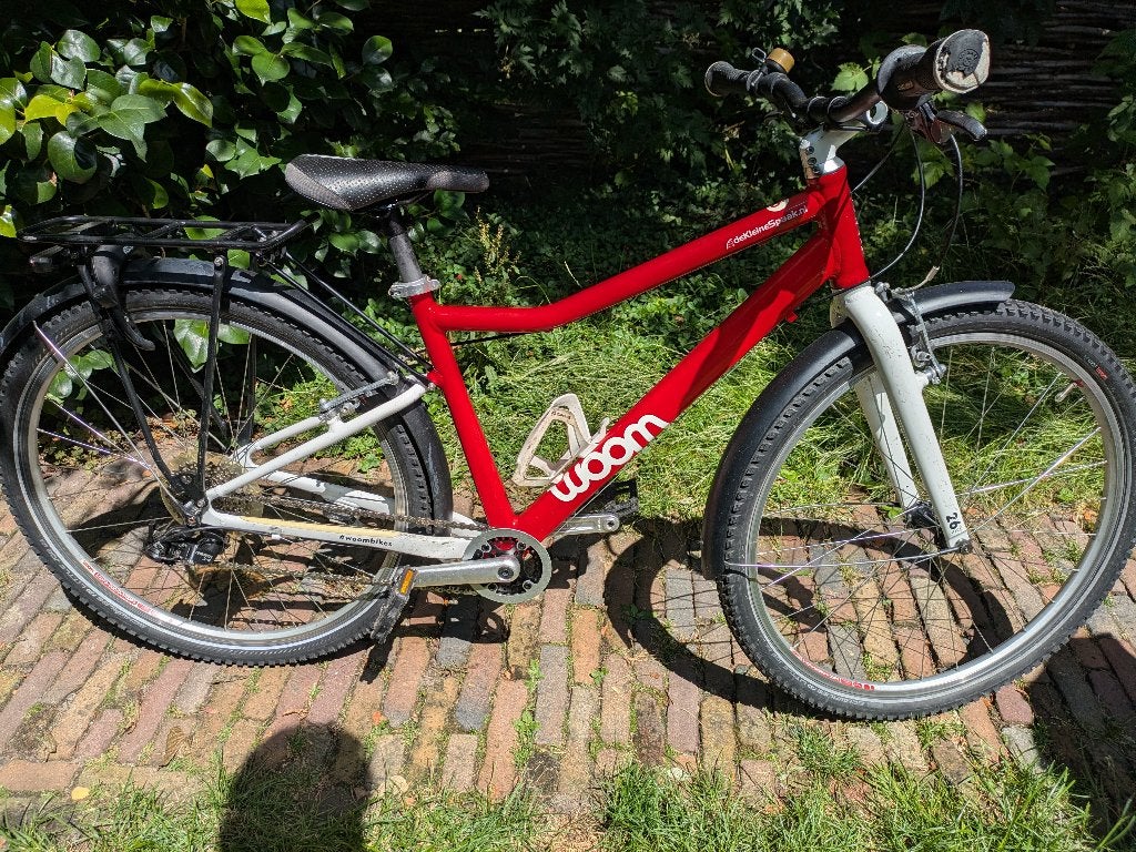 Woom 6 kinderfiets, Fietsen en Brommers, Fietsen | Kinderfietsjes, Gebruikt, 20 inch of meer, Velgrem, Ophalen