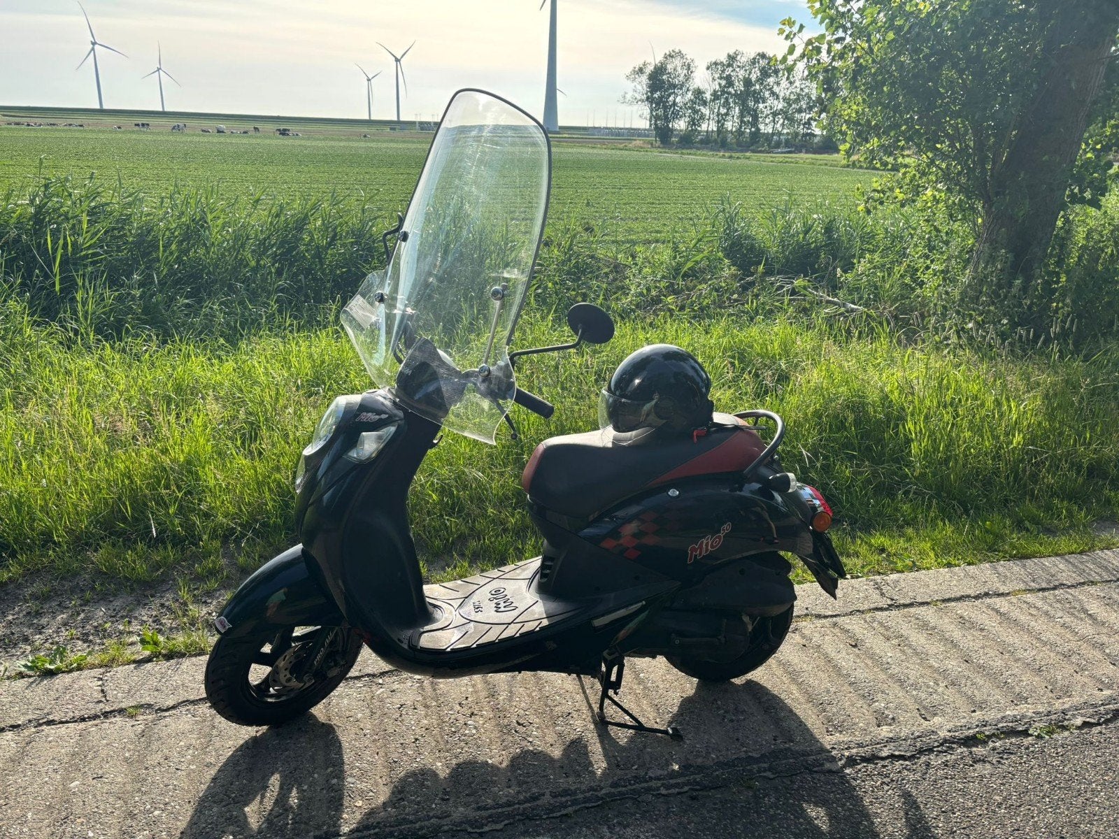 Sym Mio 50 Scooter - Zwart met windscherm, Mio, Gebruikt, Ophalen of Verzenden, Benzine