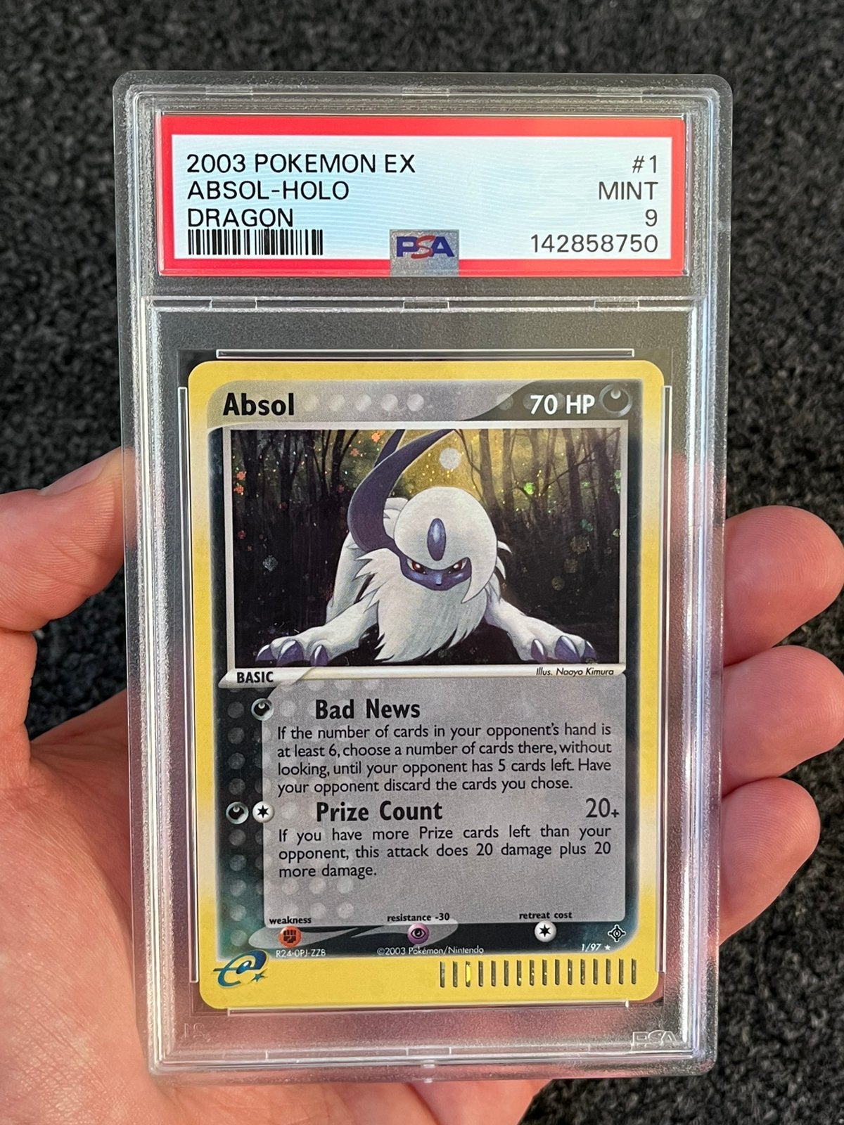 Pokémon PSA 9 Absol holo #1 ex Dragon set, Ophalen of Verzenden, Zo goed als nieuw, Losse kaart, Foil