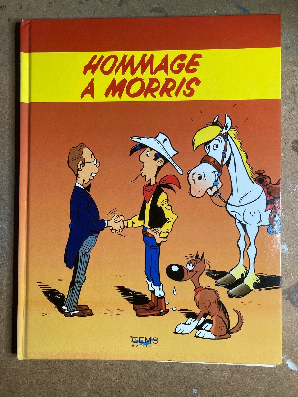 Hommage à Morris - Lucky Luke stripboek, Boeken, Eén stripboek, Ophalen of Verzenden, Zo goed als nieuw