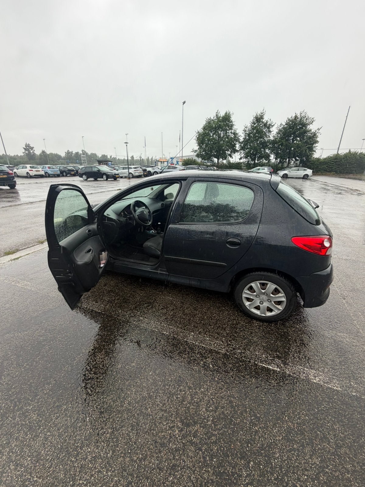 Peugeot 206+ 1.1 5D 2010 Grijs, Auto's, Voorwielaandrijving, 206+, 4 cilinders, Origineel Nederlands