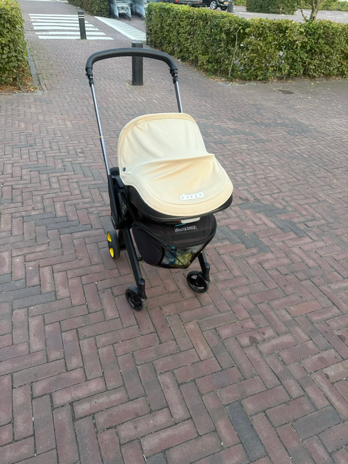 Doona I autostoel en kinderwagen in één, Kinderen en Baby's, Kinderwagens en Combinaties, Zo goed als nieuw, Met autostoeltje