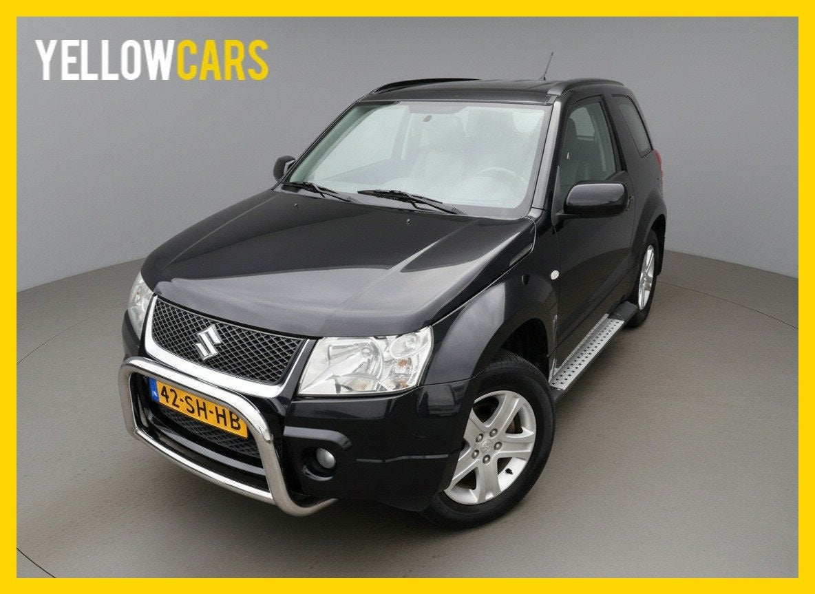 Suzuki Grand Vitara 1.6-16V Exclusive 4x4, Auto's, Suzuki, 1345 kg, Stof, Zwart, 4 cilinders