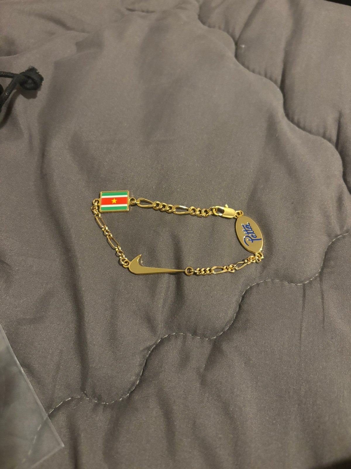 Nike x patta bracelet gold, Ophalen, Nieuw, Goud, Overige materialen