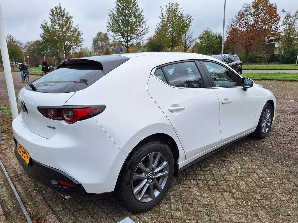 Mazda 3 2.0 e-SkyActiv-G M Hybrid 122 (b.j. 12-2022), Auto's, Mazda, Voorwielaandrijving, Stof, Euro 6, 4 cilinders