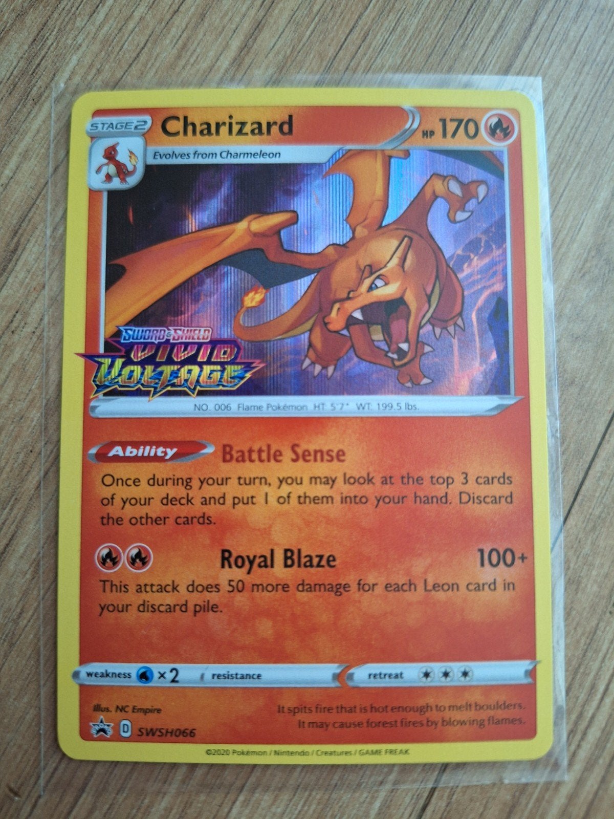 Charizard SWSH066 Vivid Voltage promo, Ophalen of Verzenden, Zo goed als nieuw, Losse kaart