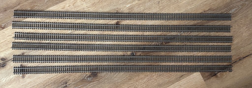 Märklin 6 x 2205 plus 3 x 10 mtr bedding (Merkur Styroplast), Hobby en Vrije tijd, Ophalen, Wisselstroom, Gebruikt, Rails