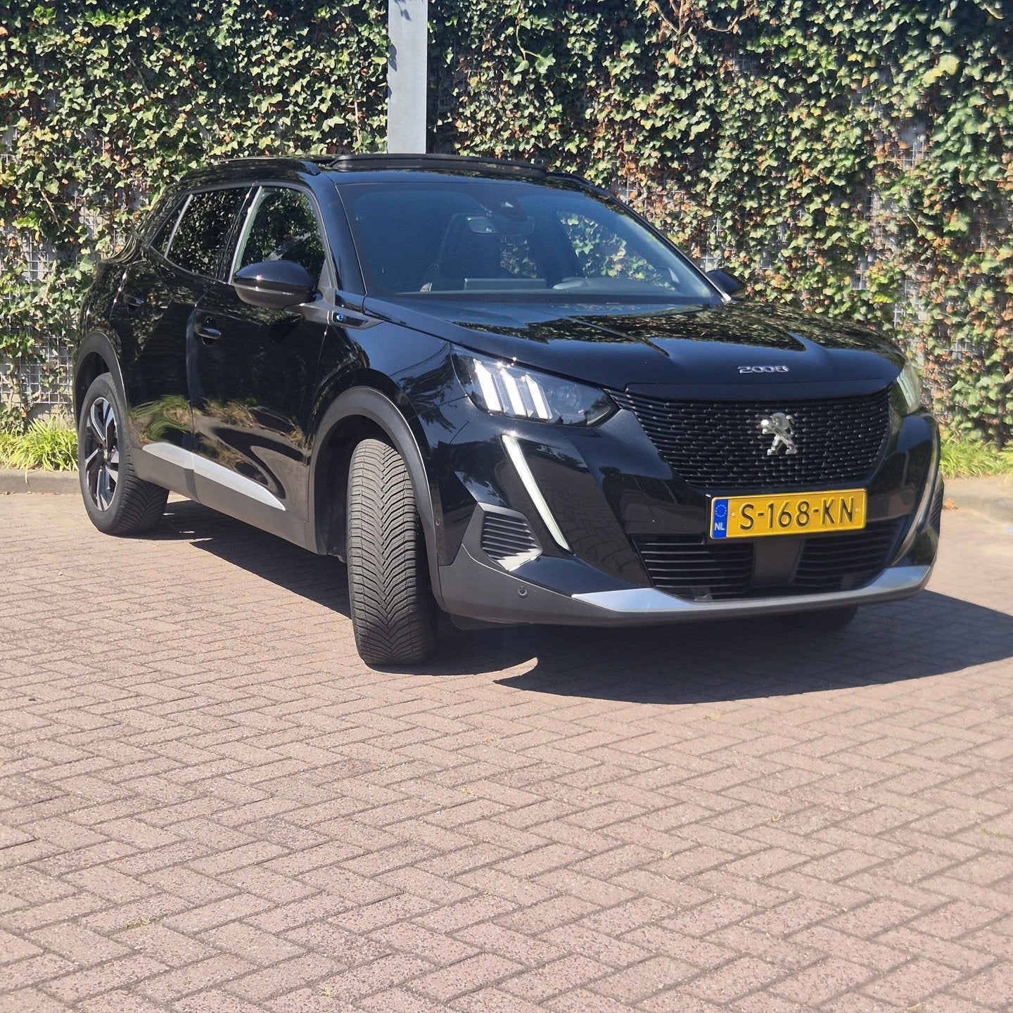 Peugeot E-2008 GT | Pano | ACC |SOH 95,44 % | Warmtepomp | 1, Auto's, 136 pk, Gebruikt, Leder en Stof, Zwart