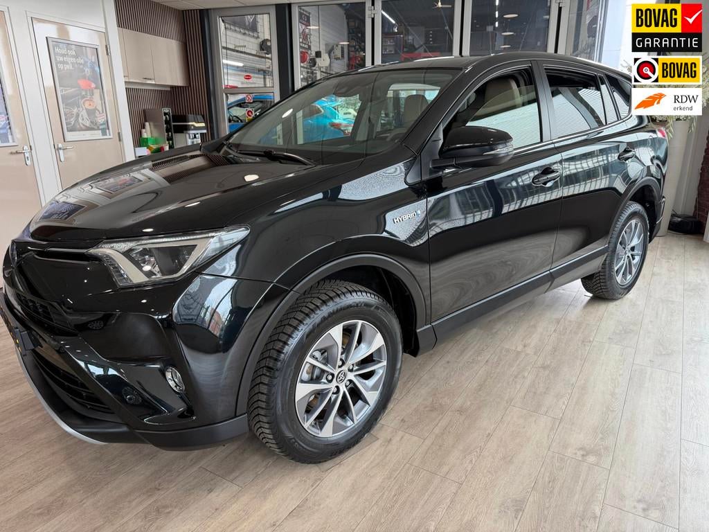 Toyota RAV4 2.5 Hybrid Dynamic Business Plus, Auto's, Toyota, Gebruikt, Zwart, Bedrijf, 155 pk