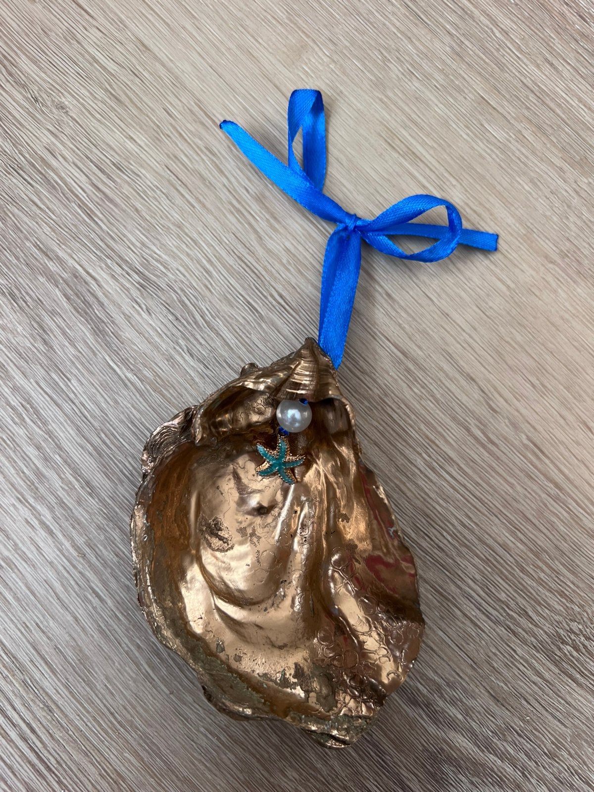 Schelpenhanger goud, Ophalen of Verzenden, Zo goed als nieuw